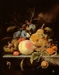 Nature morte de fruits et noix sur un rebord de pierre